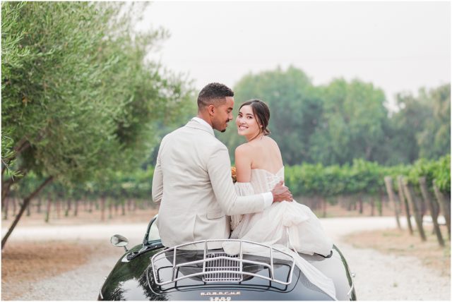 How to have a beautiful micro wedding during covid-19: bride and groom portraits on a vintage Porsche at Sunstone Winery