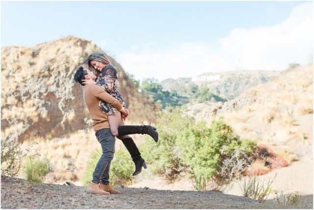 Engagement shoot with engaged couple at the Bronson Bat Caves in the Hollywood Hills with Hollywood sign in background.