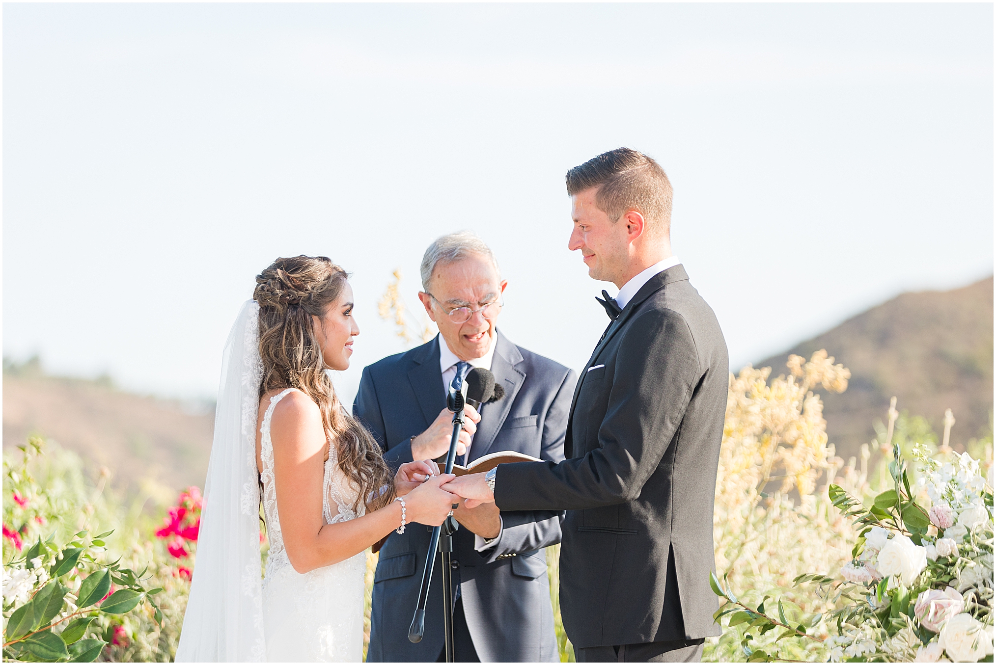 An intimate summer Malibu Canyon wedding in early September. Tiffany and Jason say "I do!" on a hilltop with 360 views of Malibu Canyon!